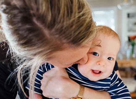 Indications that a baby is attached for effective suckling during breastfeeding